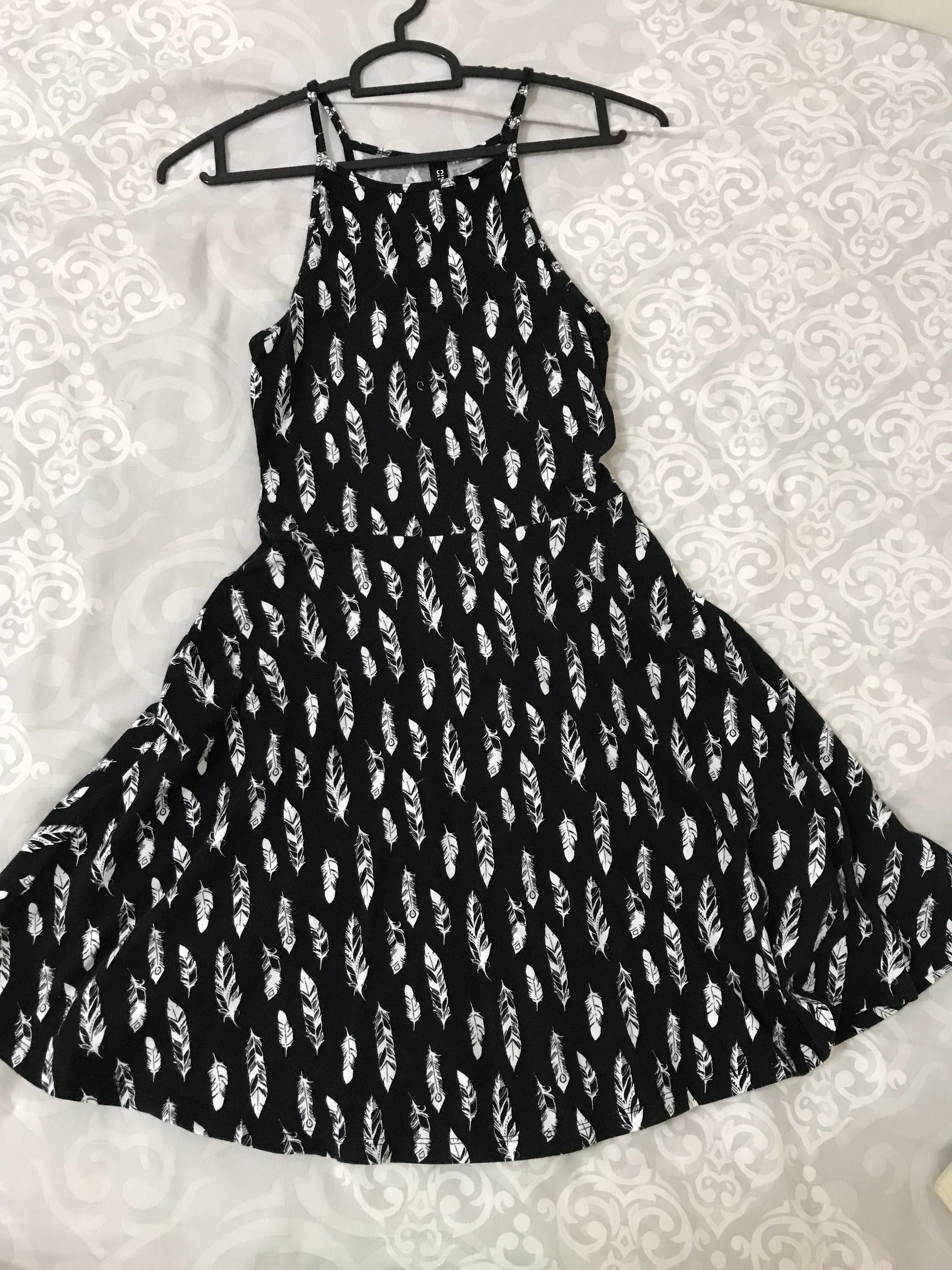H M black sleeveless feather design dress