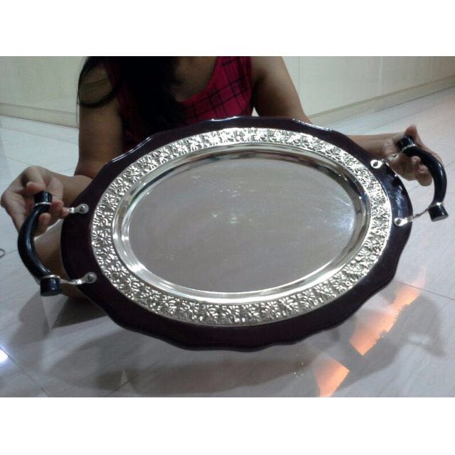 Serving Tray (Category: Coffee & Tea Tableware) located in Singapore. Submitted by raj.bhagchandani (Listing ID 81597328, Image 2). Description: Serving Tray to serve your guests in style. Strong wooden base with and shiny metallic top..