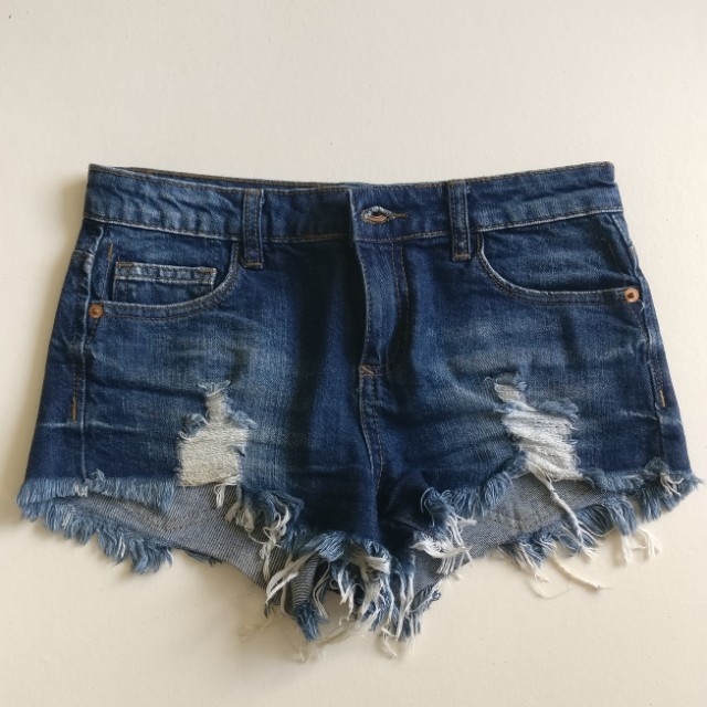 torn short jeans