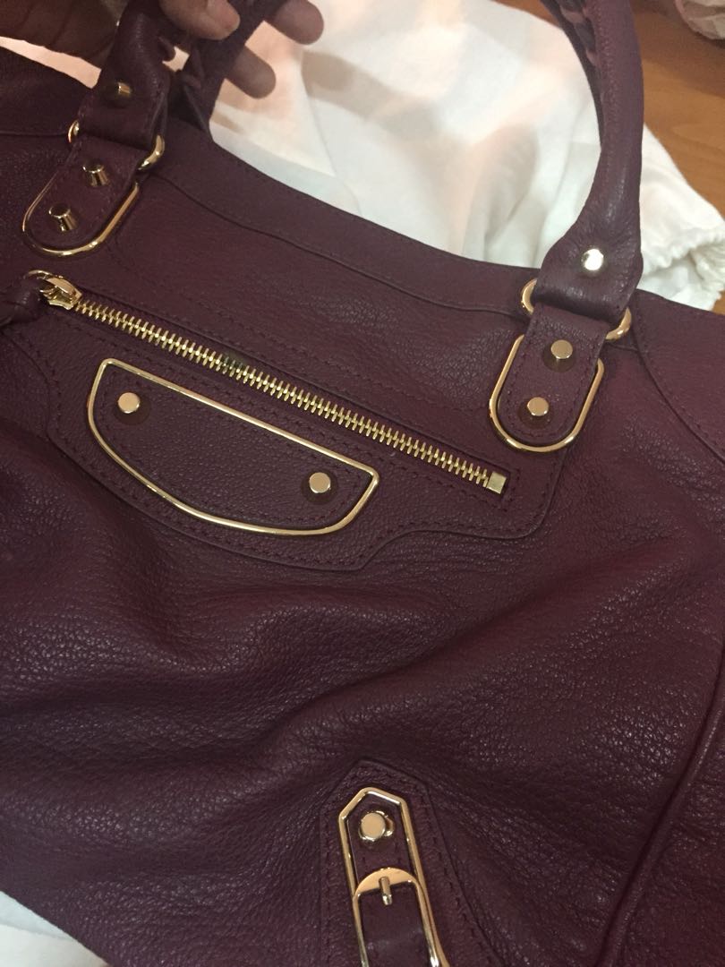 maroon satchel