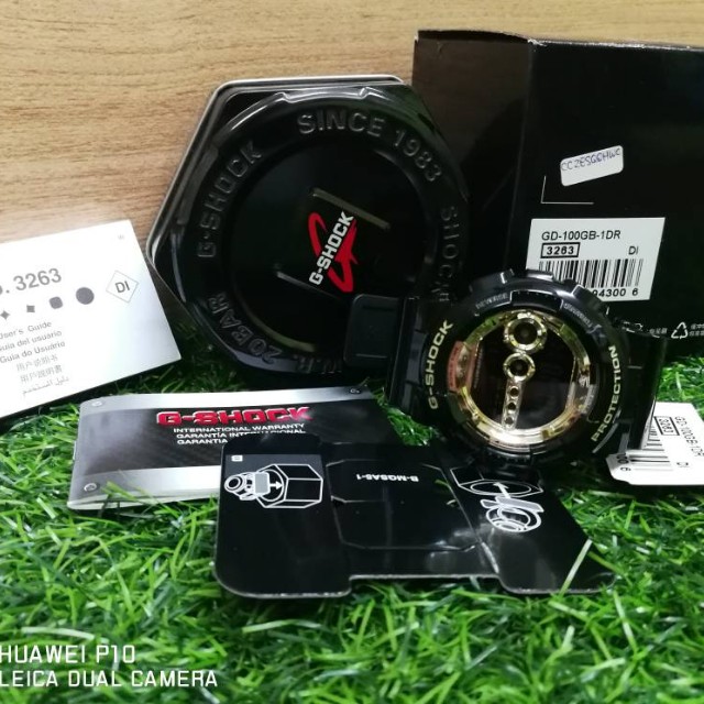 G shock gd 100 black gold 2025