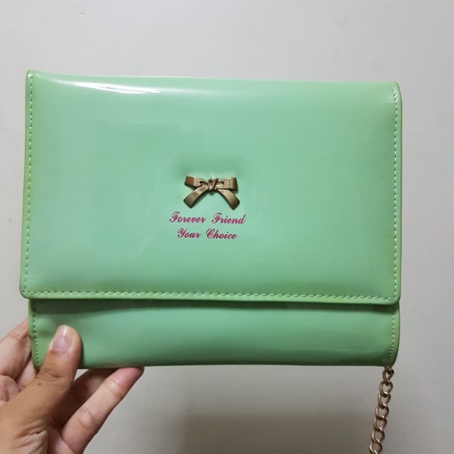 green clutch bag