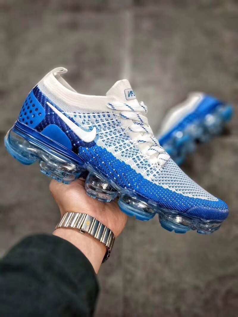 white and blue vapormax