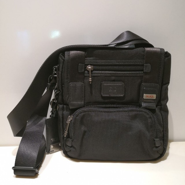 tumi small sling bag