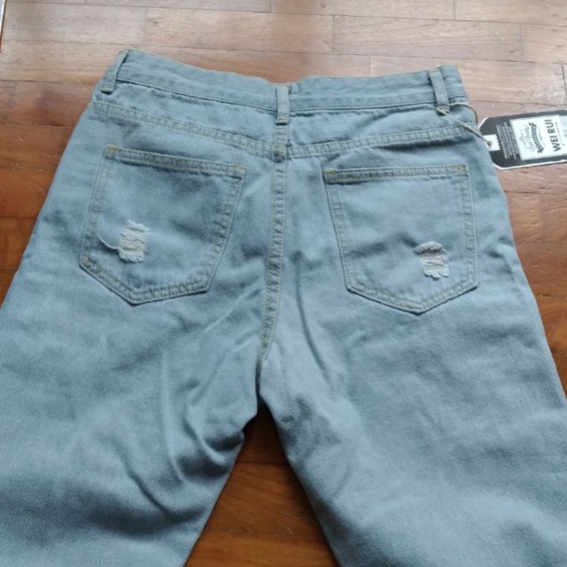 Hot Sale Women Light Blue Ripped Jeans Pant main image 0