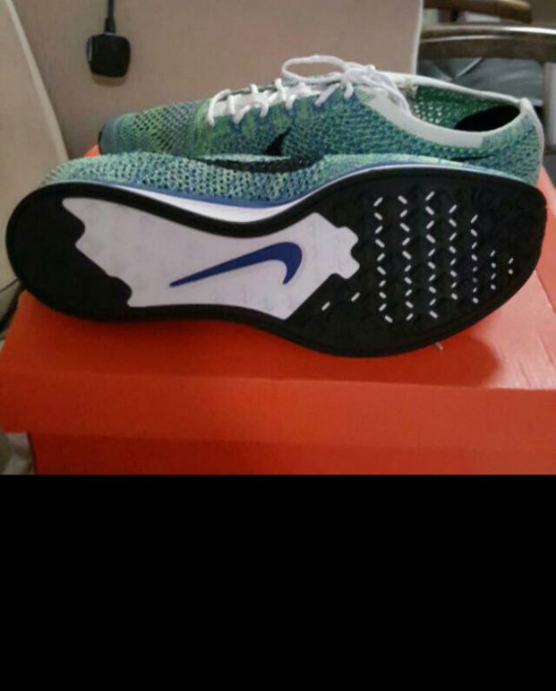 Nike Flyknit Racer tranquil green strike Men s Fashion Footwear