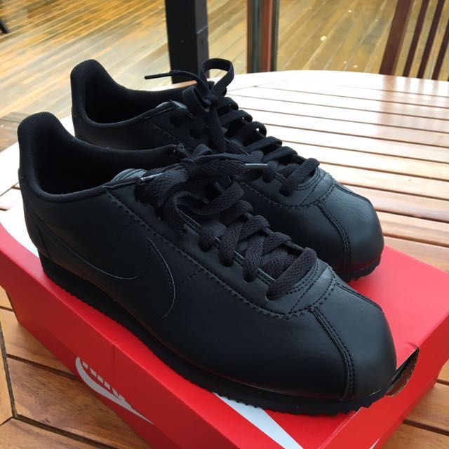 Ladies black nike cortez top