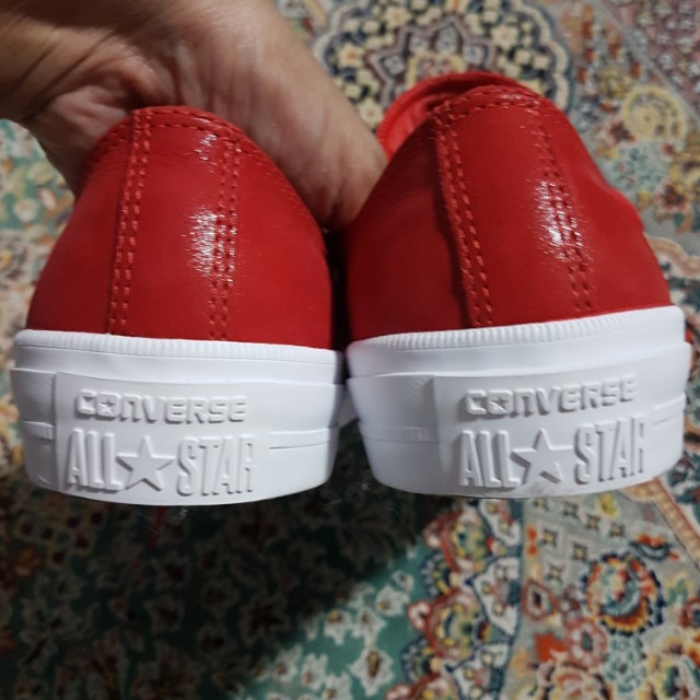 Red leather hotsell converse