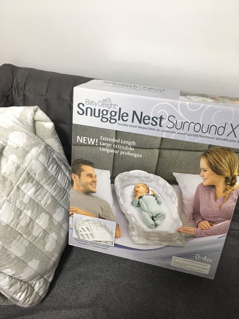 Snuggle Nest Surround Xl Babies Kids On Carou Photo