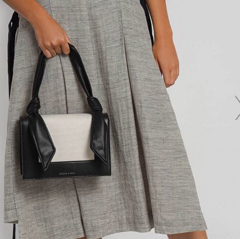 Charles Keith Black and White Knotted Strap Handbag