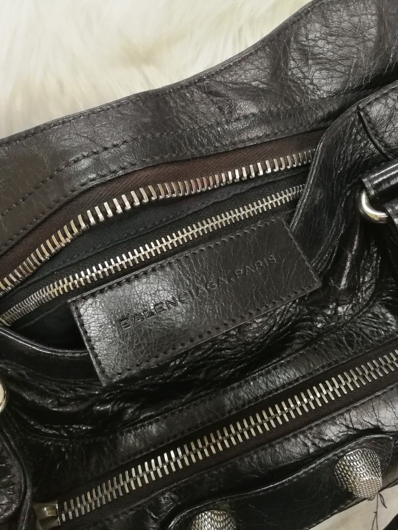 Balenciaga Bag (Category: Bags & Wallets) located in Singapore. Submitted by jjstore12 (Listing ID 161546055, Image 2). Description: Condition 8/10 Sent for Recolour to black for $500 and bag spa and leather conditioning Self collection No trade No refund.
