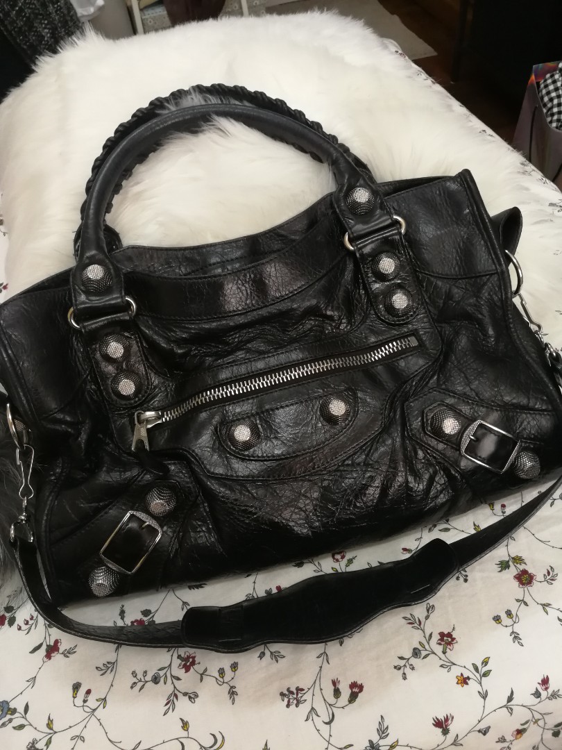 Balenciaga Bag (Category: Bags & Wallets) located in Singapore. Submitted by jjstore12 (Listing ID 161546055, Image 1). Description: Condition 8/10 Sent for Recolour to black for $500 and bag spa and leather conditioning Self collection No trade No refund.