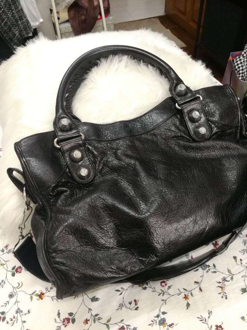 Balenciaga Bag (Category: Bags & Wallets) located in Singapore. Submitted by jjstore12 (Listing ID 161546055, Image 3). Description: Condition 8/10 Sent for Recolour to black for $500 and bag spa and leather conditioning Self collection No trade No refund.