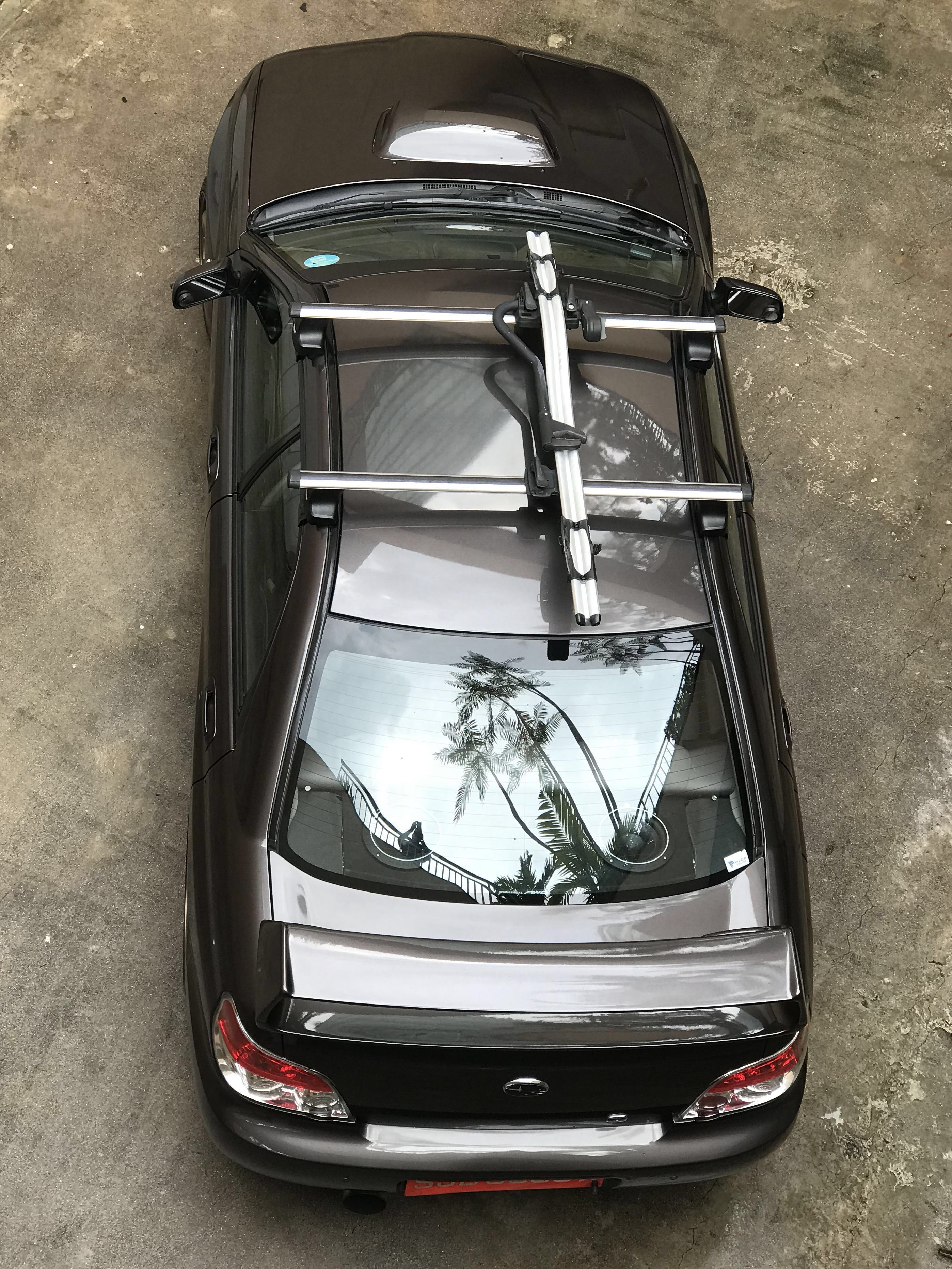 Subaru impreza thule online roof rack