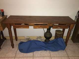 Long console table with three small draws
