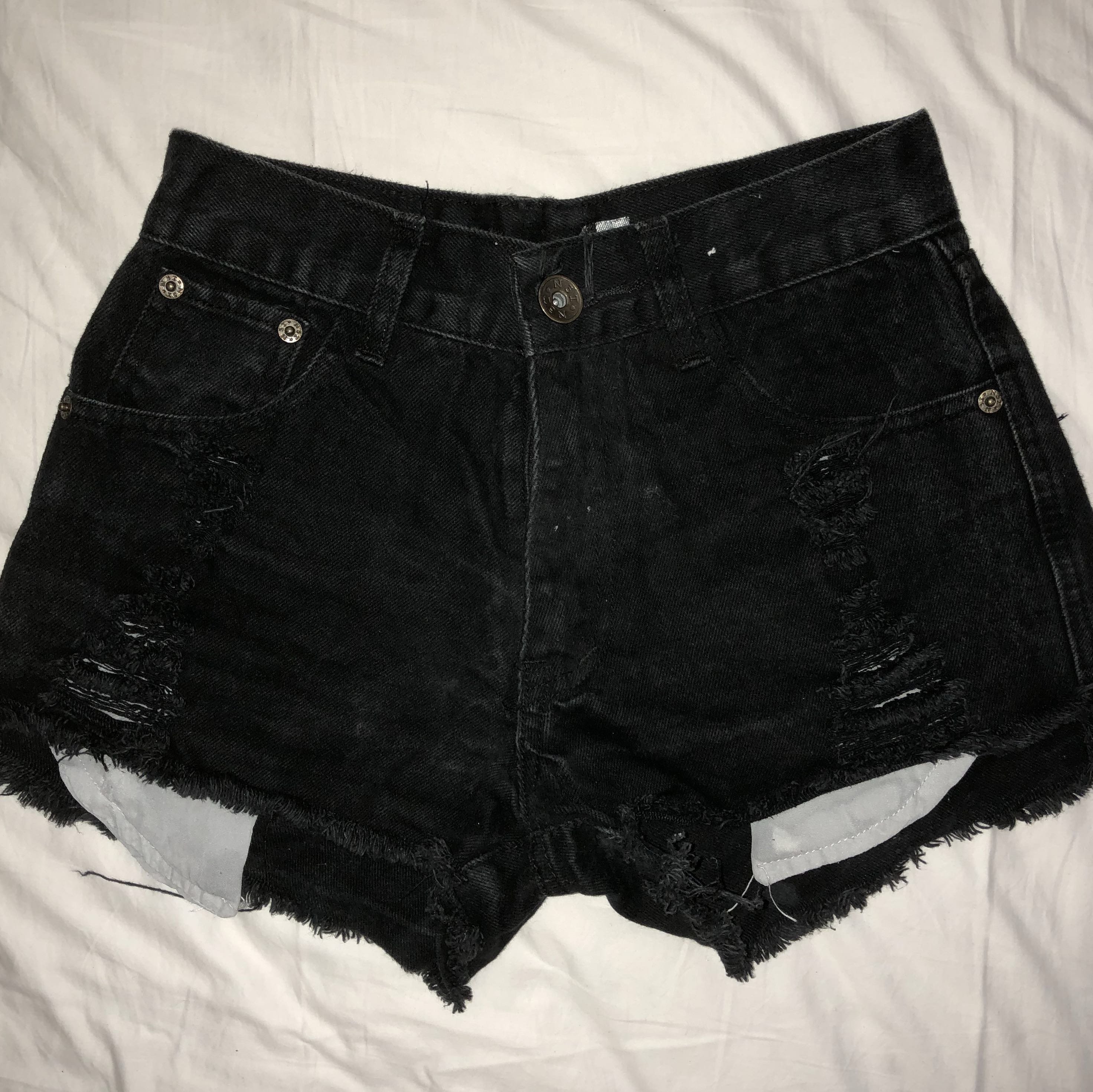 black ripped jeans shorts