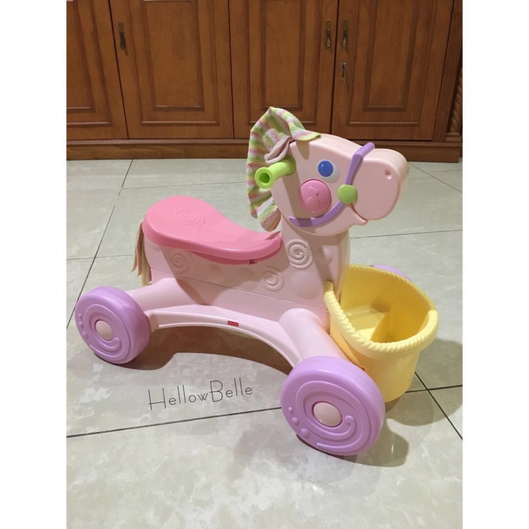 Fisher price roll hot sale along musical pony