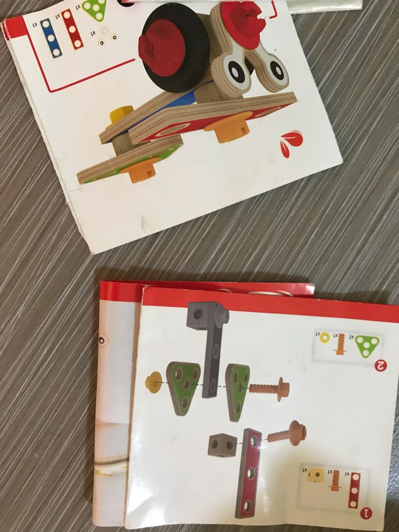 Hape Basic Builder Set (Category: Infant Playtime) located in Singapore. Submitted by limxinyiz (Listing ID 161995169, Image 4). Description: Used item but all the pieces are still intact and in good condition. The small booklet that comes with it is a little torn but we have fixed it with tape. Fun builder set for toddlers!.