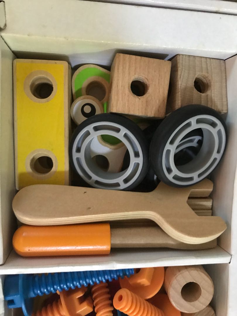 Hape Basic Builder Set (Category: Infant Playtime) located in Singapore. Submitted by limxinyiz (Listing ID 161995169, Image 5). Description: Used item but all the pieces are still intact and in good condition. The small booklet that comes with it is a little torn but we have fixed it with tape. Fun builder set for toddlers!.