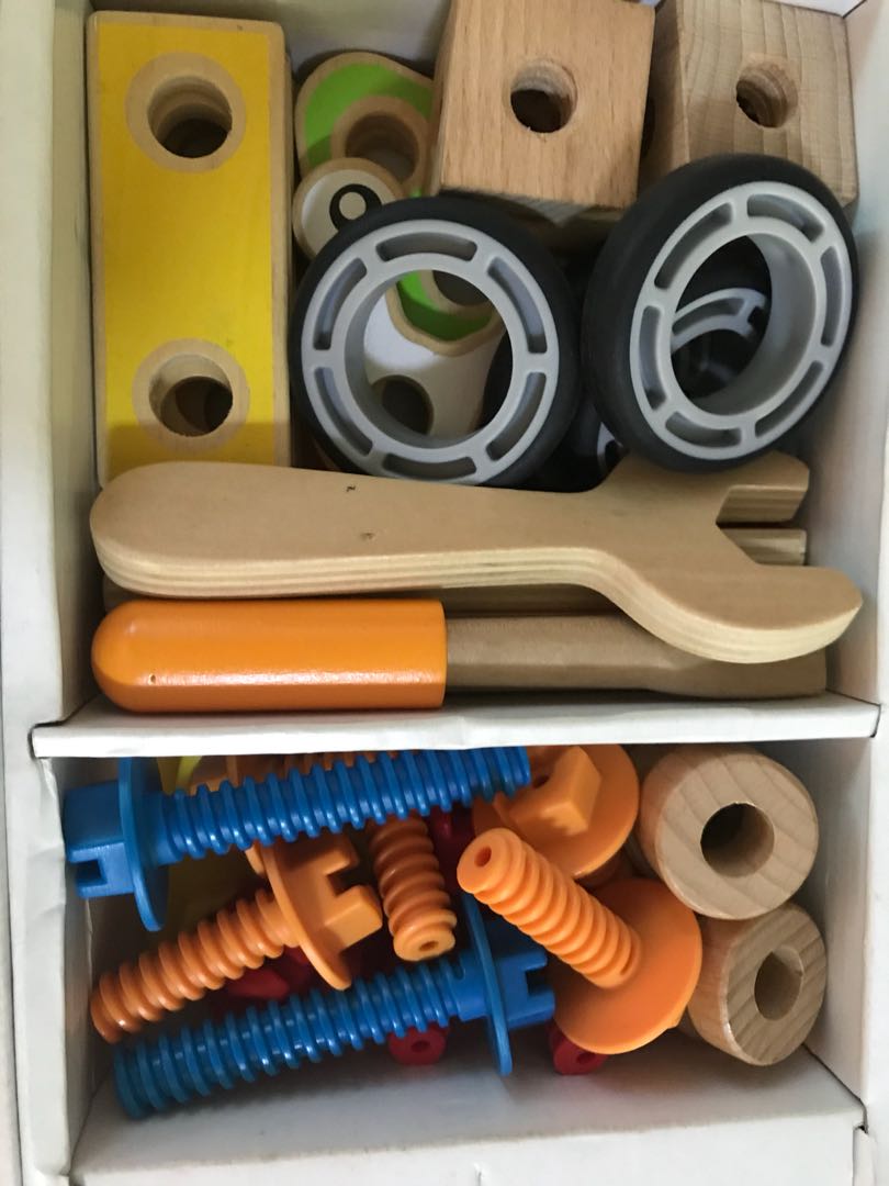 Hape Basic Builder Set (Category: Infant Playtime) located in Singapore. Submitted by limxinyiz (Listing ID 161995169, Image 6). Description: Used item but all the pieces are still intact and in good condition. The small booklet that comes with it is a little torn but we have fixed it with tape. Fun builder set for toddlers!.