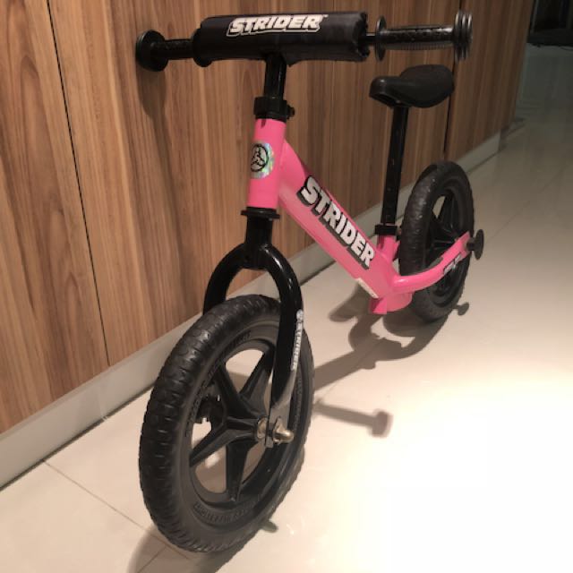 strider balance bike pink