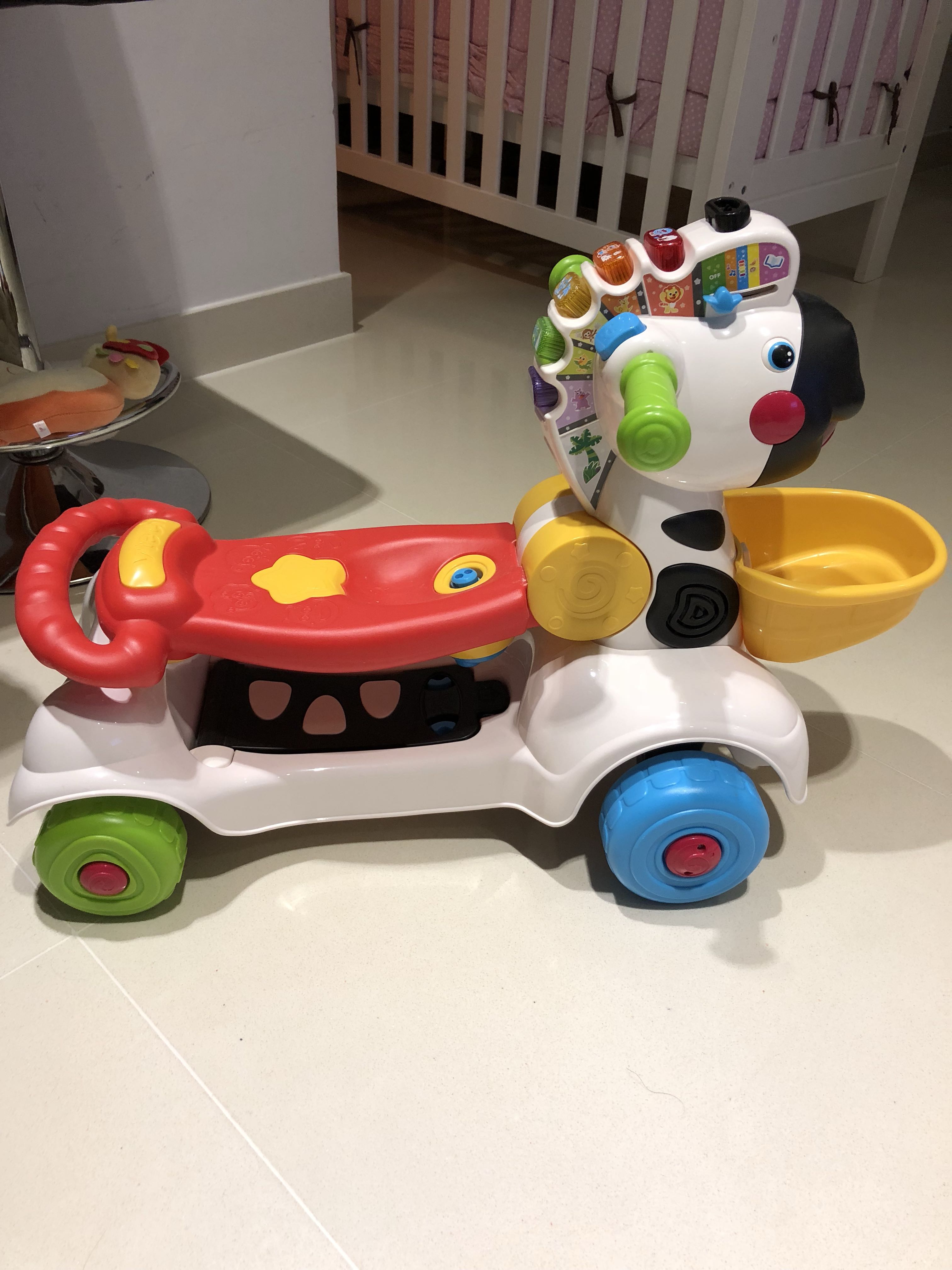 fisher price zebra walker disassembly