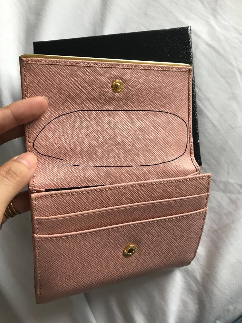 PRADA Saffiano Compact Wallet in Orchid Pink (Category: Luxury Bags & Wallets) located in Las Pinas. Submitted by itsta7 (Listing ID 162774790, Image 3). Description: ✨ PRADA Saffiano Compact Wallet in Orchid Pink ✨ 🍍 Courier: Air21 or LBC 🍍 Will allow pick up for the item 🍍 Payment Options : BPI / Landbank 🍍 Reservation 24 hrs only 🍍 No Returns / Exchange / Swap - Used but still in very good condition - There are minimals scratches in the i