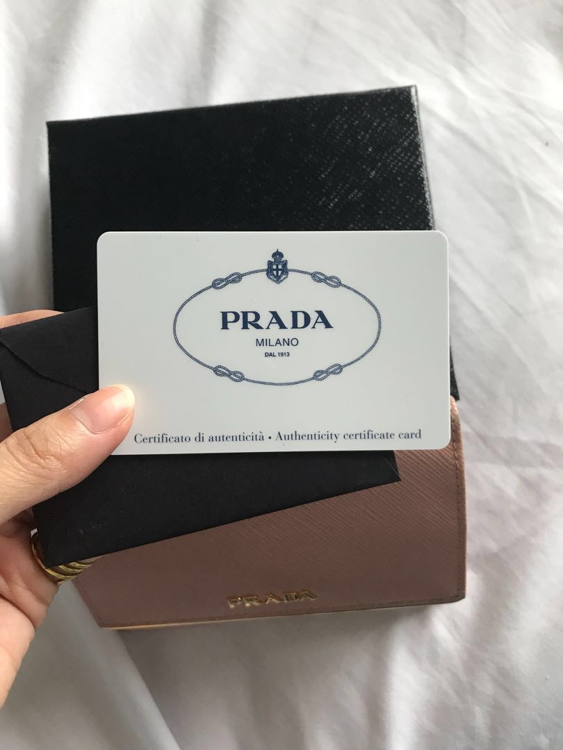 PRADA Saffiano Compact Wallet in Orchid Pink (Category: Luxury Bags & Wallets) located in Las Pinas. Submitted by itsta7 (Listing ID 162774790, Image 2). Description: ✨ PRADA Saffiano Compact Wallet in Orchid Pink ✨ 🍍 Courier: Air21 or LBC 🍍 Will allow pick up for the item 🍍 Payment Options : BPI / Landbank 🍍 Reservation 24 hrs only 🍍 No Returns / Exchange / Swap - Used but still in very good condition - There are minimals scratches in the i