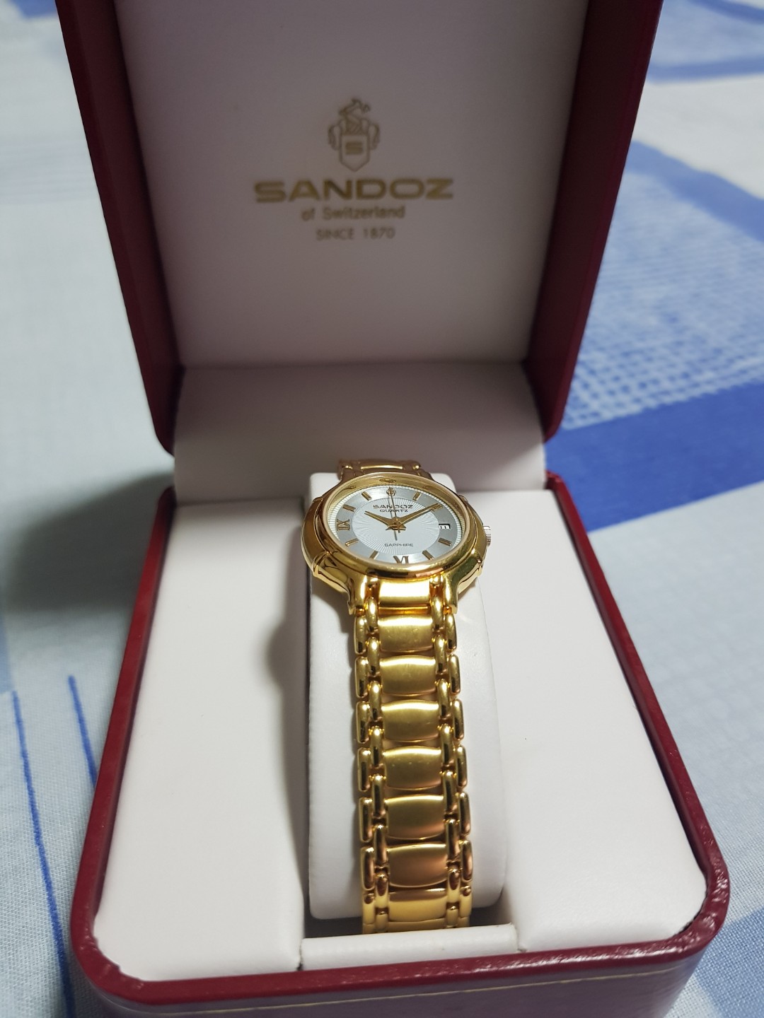 Sandoz gold watch price best sale
