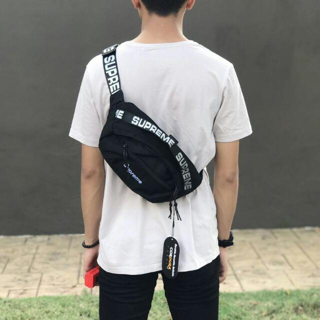 supreme shoulder bag on person