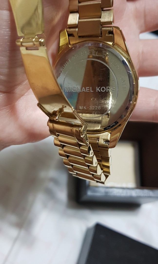 Michael kors gold and emerald watch 