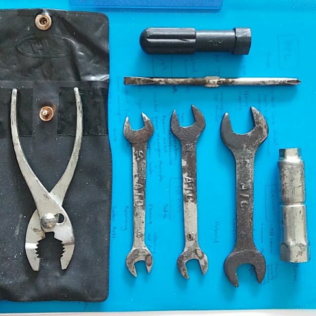 Original Motorcycle Toolkit pliers, spark plug tool, wrenches