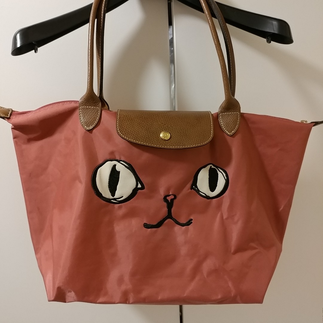 Longchamp cat 2024 eye bag