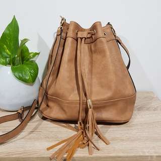 Marikai light tan bucket bag