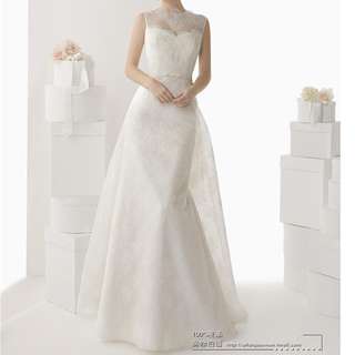 Wedding gown with detachable train at back