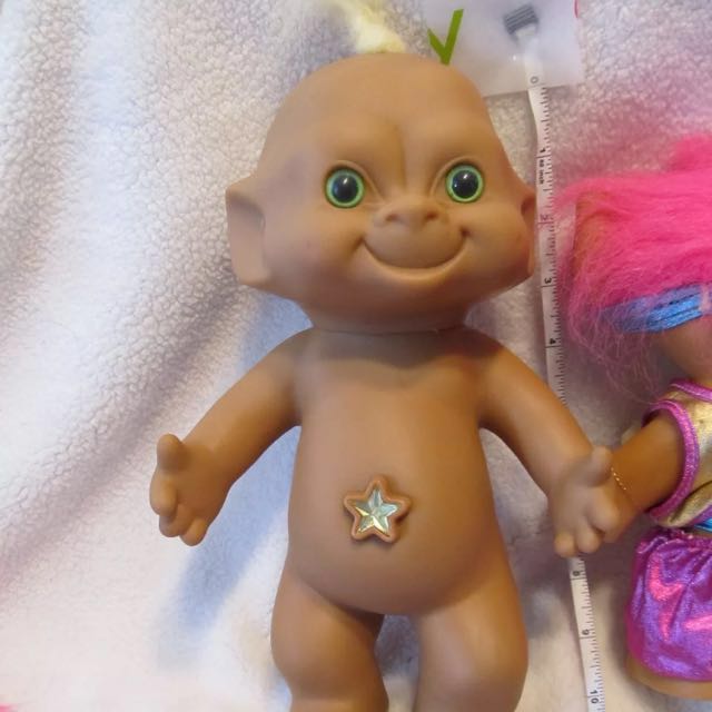 troll doll with gem in belly