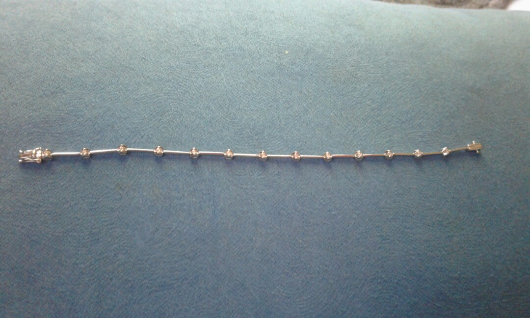 18k Whitegold Bracelet with real diamonds (Category: Bracelets) located in Cavite. Submitted by marie_xcess (Listing ID 164462420, Image 1). Description: Pawnable Certificate of Authencity is included 4.9 grams , 17.5 Length with 13pcs 0.5ct of diamonds Very nice in actual.
