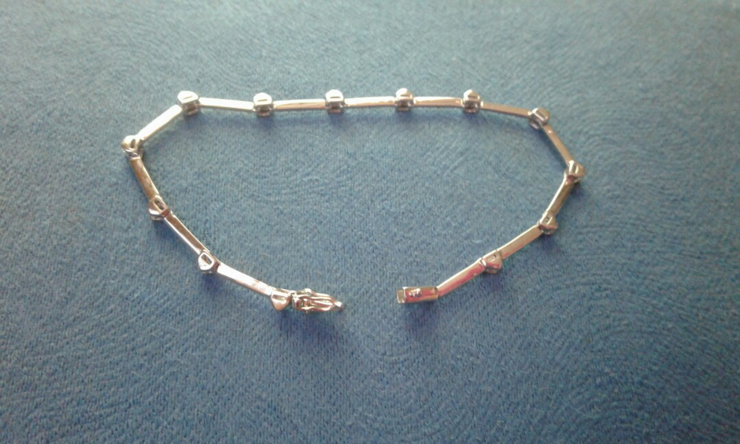 18k Whitegold Bracelet with real diamonds (Category: Bracelets) located in Cavite. Submitted by marie_xcess (Listing ID 164462420, Image 2). Description: Pawnable Certificate of Authencity is included 4.9 grams , 17.5 Length with 13pcs 0.5ct of diamonds Very nice in actual.