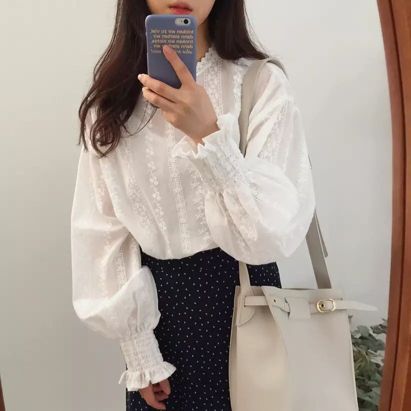 white blouse with flowy sleeves