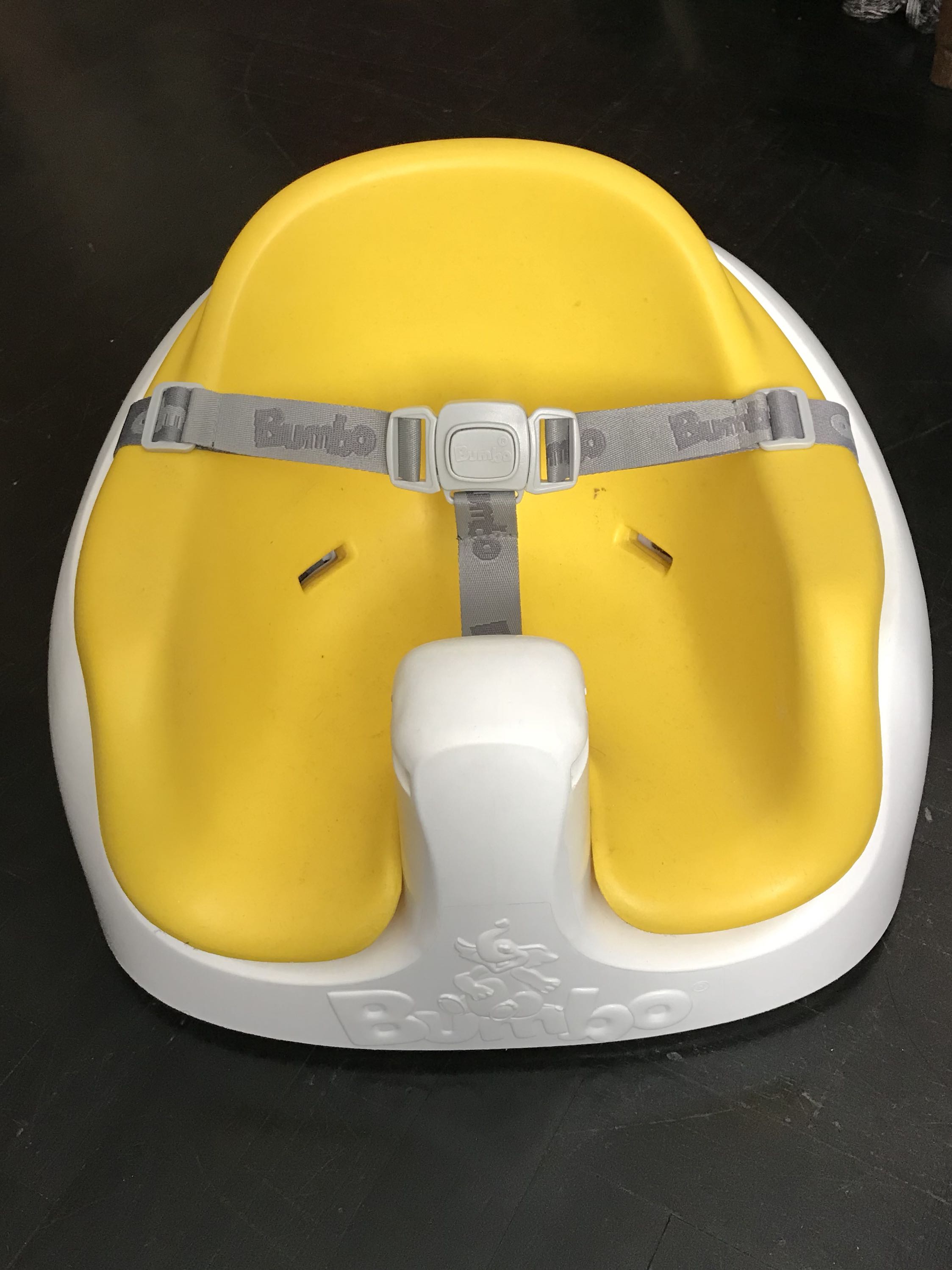 yellow bumbo seat with tray