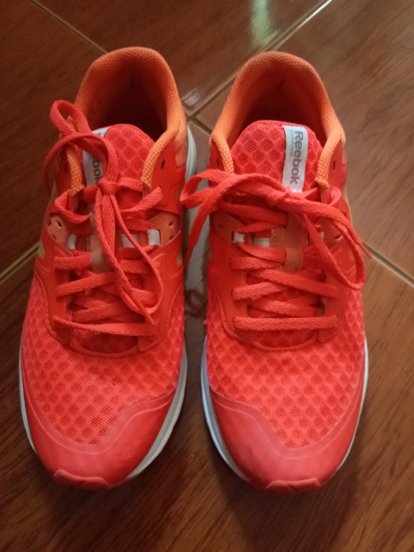 Reebok neon orange running shoes, Women 