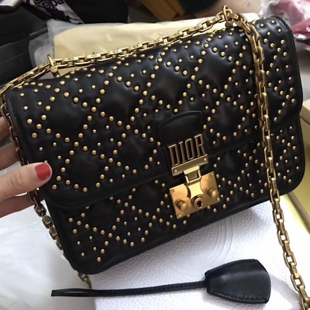 Dioraddict flap bag in black studded cannage lambskin