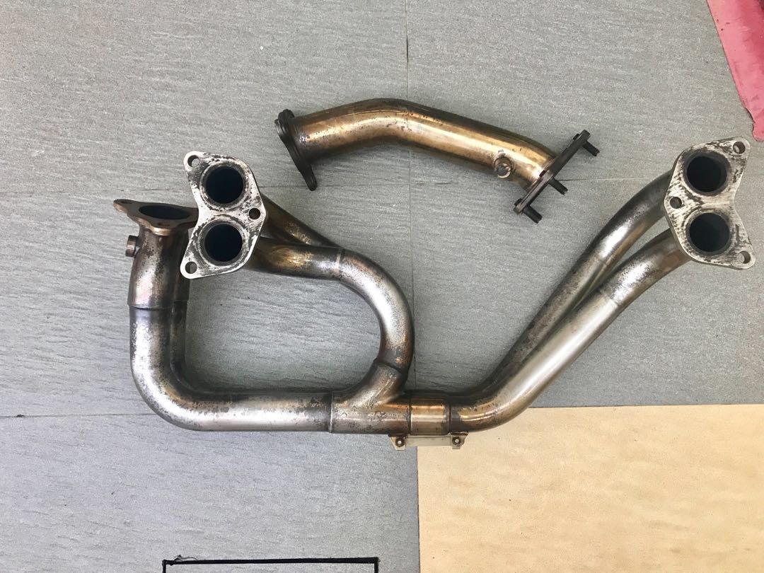 Tomei headers shop sti