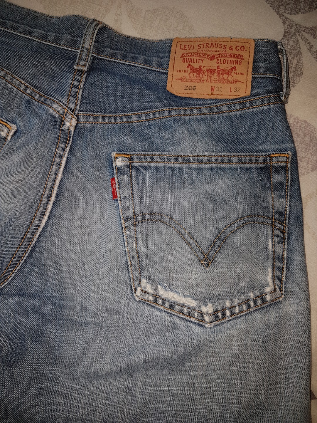 Levis 506 Ripped & patched, Men's Fashion, Bottoms, Jeans on Carousell
