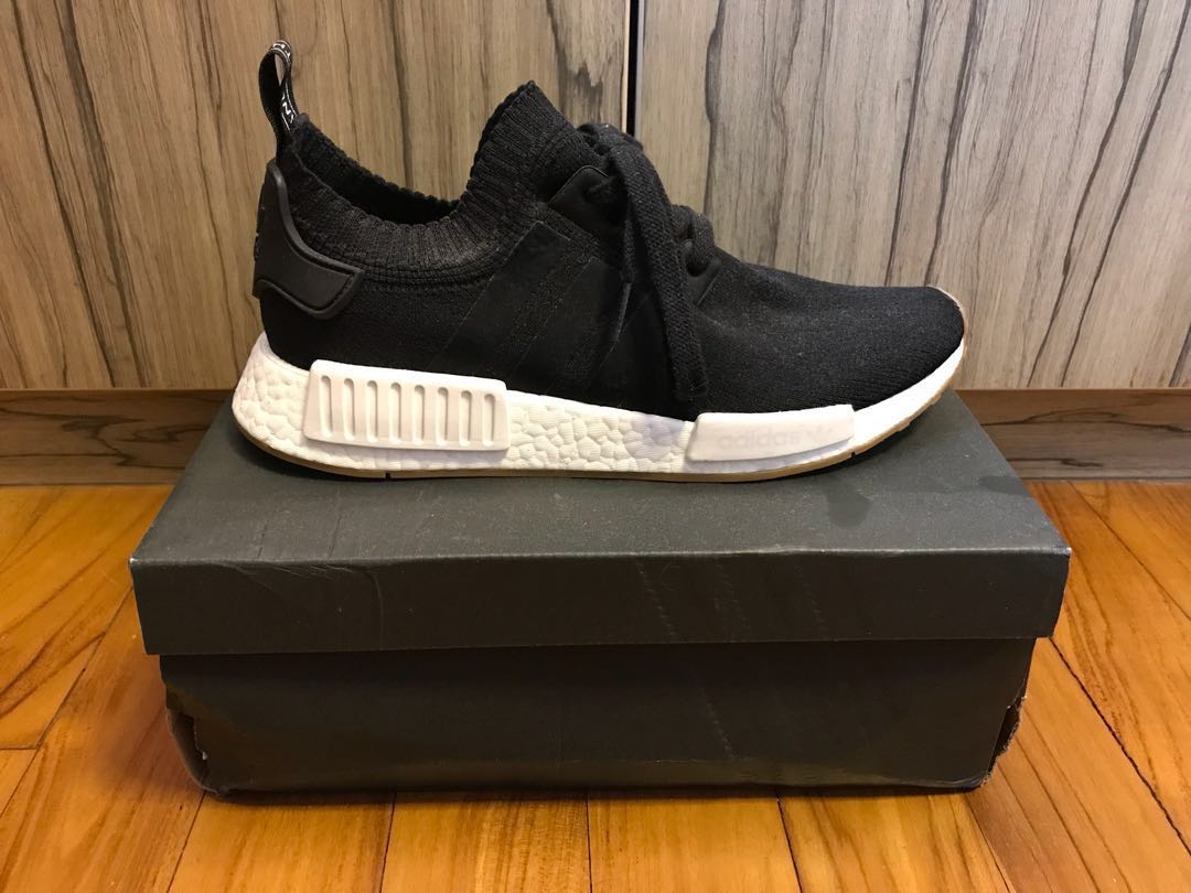 nmd r1 black gum sole