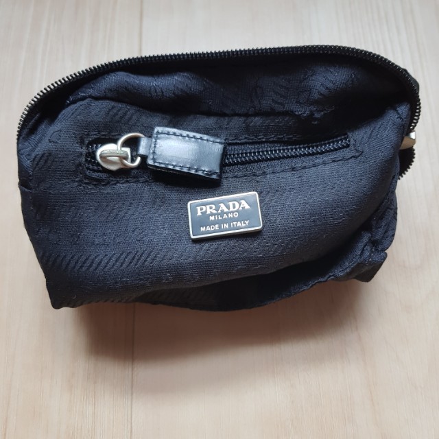 Prada Pouch (Category: Bags & Wallets) located in Singapore. Submitted by apple001 (Listing ID 166013496, Image 2). Description: Measurement 15cmx12cm In good condition.