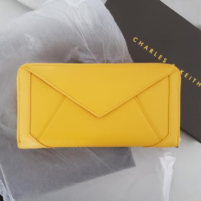charles and keith yellow wallet