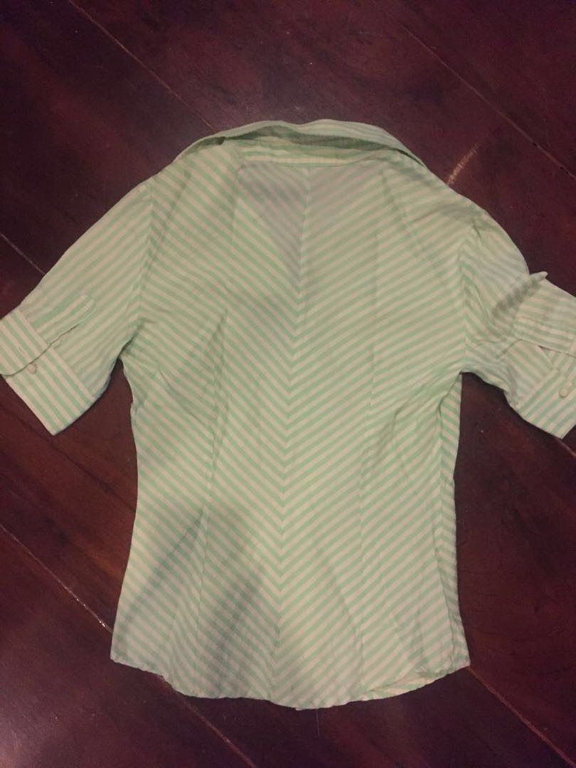 Mango button down top (Category: Blouses) located in Makati City. Submitted by di_one (Listing ID 164468960, Image 2). Description: Perfect condition colors are made for the summer season Mint green stripes and pearl button detail .