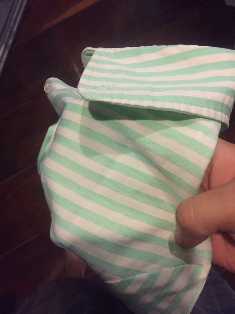 Mango button down top (Category: Blouses) located in Makati City. Submitted by di_one (Listing ID 164468960, Image 3). Description: Perfect condition colors are made for the summer season Mint green stripes and pearl button detail .