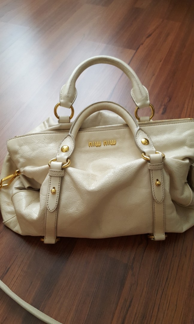 Authentic Miu Miu Vitello Lux Bow Leather Hand Bag in Cream with Gold  Hardware